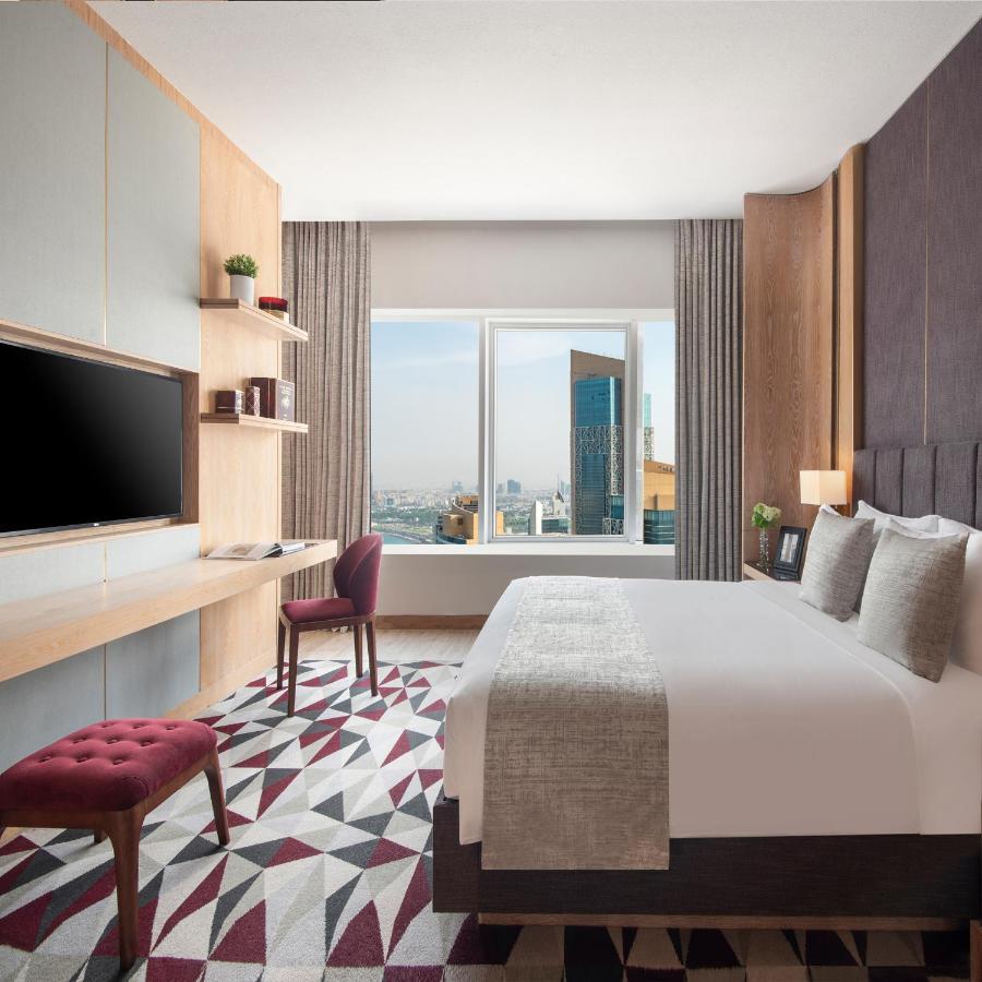 The Bentley Luxury Hotel & Suites Doha Exterior foto Deluxe Room