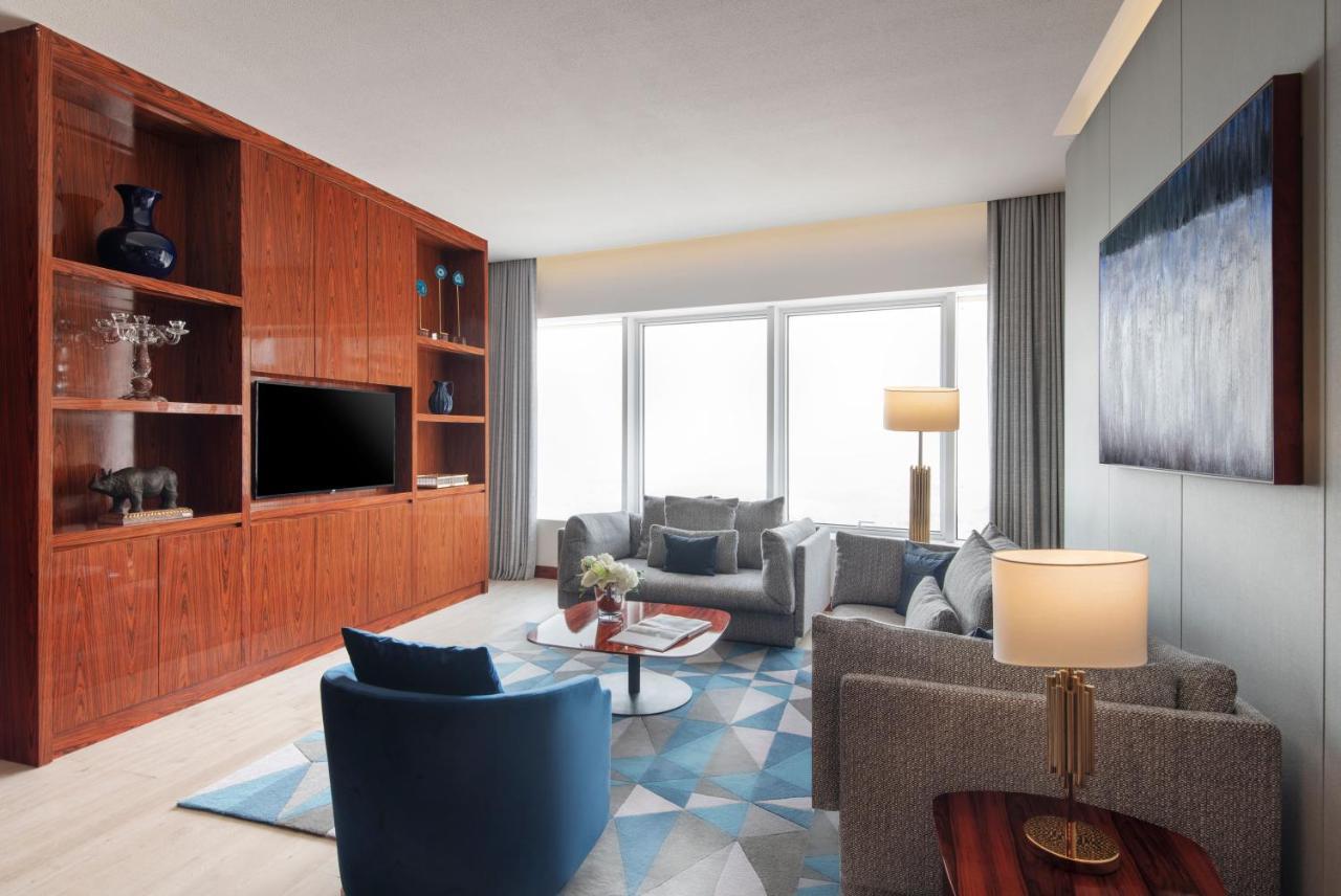 The Bentley Luxury Hotel & Suites Doha Exterior foto Living room
