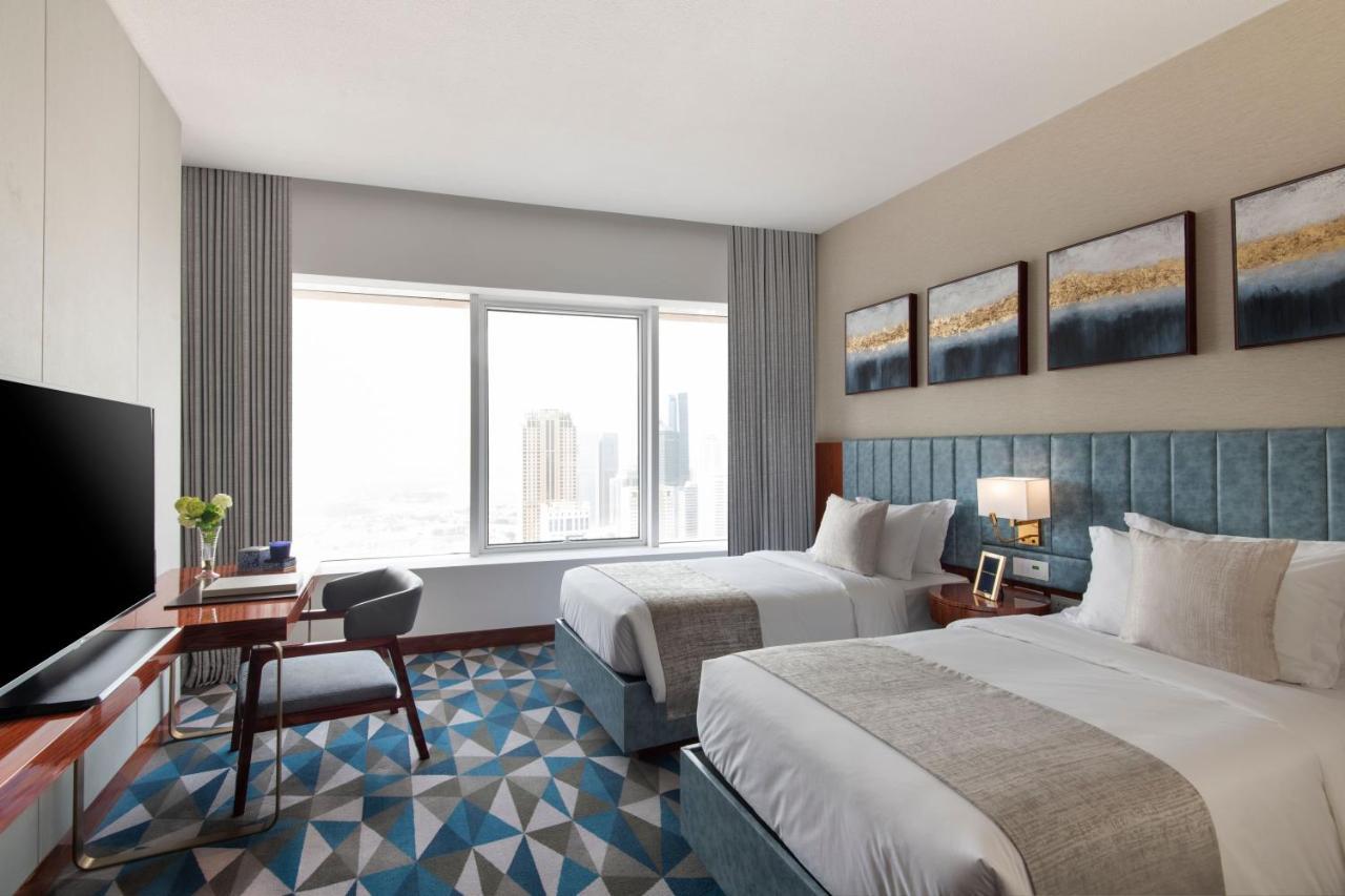 The Bentley Luxury Hotel & Suites Doha Exterior foto Deluxe Room